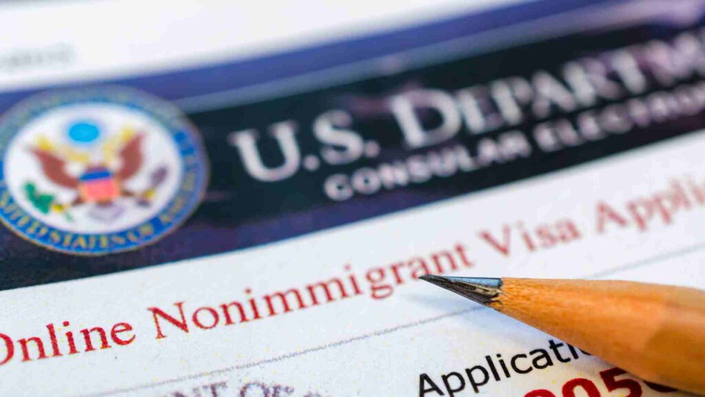 A US non immigration form with a pencil